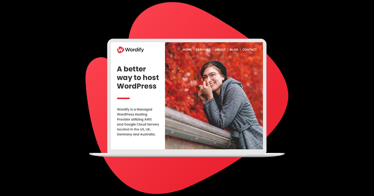 A laptop displays the Wordify website, featuring a woman in glasses and a beanie smiling against an autumn background, with text promoting WordPress hosting services.